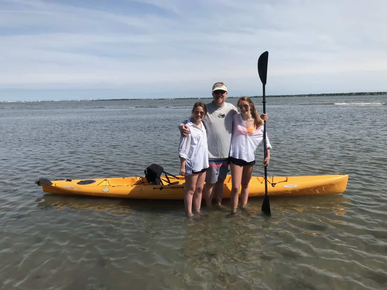 My daughters and I standing with our 16' Hobie Adventure Kayak in  Bogue Sound NC.