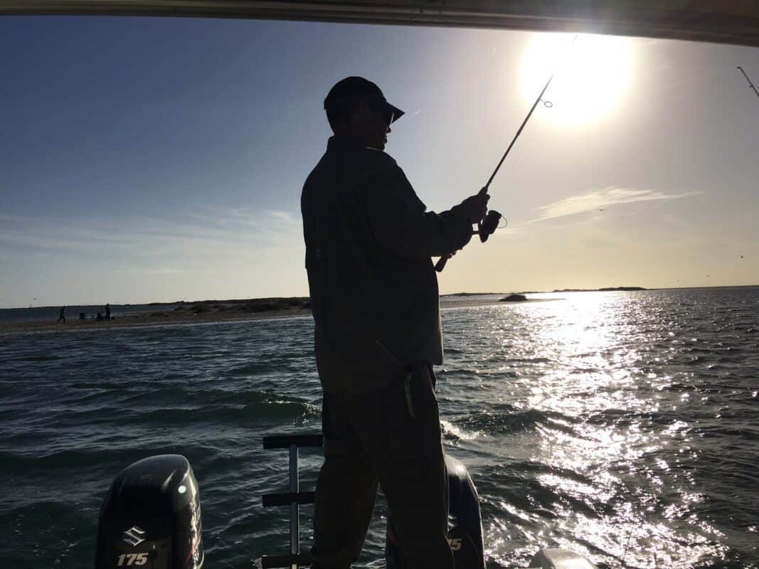 Saltwater fishing with a spinning reel to catch saltwater trout
